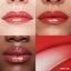 Lip macros of three skin tones wearing the MoistureGlow™ Plumping Lip Serum in shade Cherry Glow.