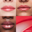 Lip macros of three skin tones wearing the MoistureGlow™ Plumping Lip Serum in shade Strawberry Glow.